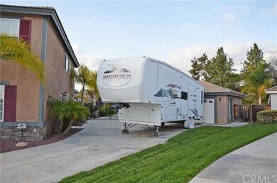 Beautiful fully landscaped home with RV parking an
