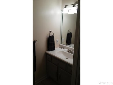 Bathroom. Half bath with refinished vanity with ne