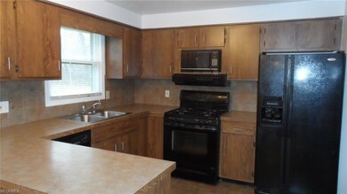 newer kitchen with refrig, stove, micro and dishwasher