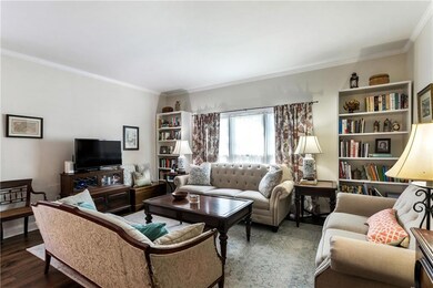The living area is spacious and filled with natura