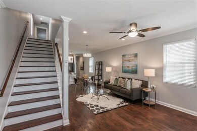 Welcoming staircase with gorgeous solid hardwood s