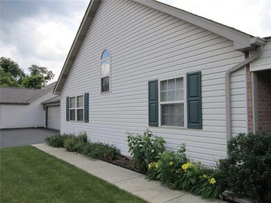 Exterior Front. Sidewalk wraps around the side of 