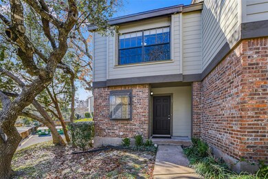 Property entrance with brick siding