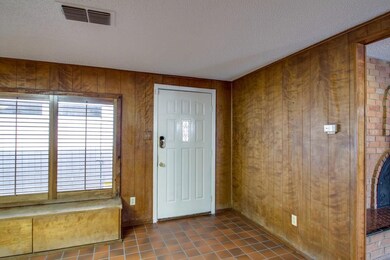 Open living space at entry.