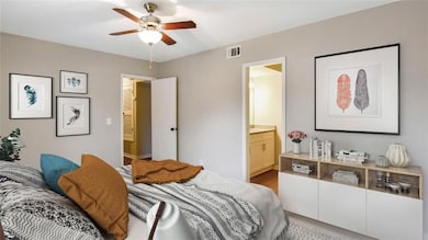Bedroom with light hardwood / wood-style floors, c