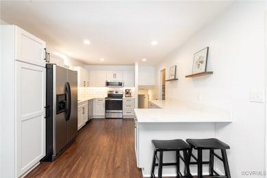 Kitchen with appliances with stainless steel finis