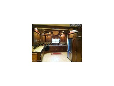 Open kitchen with plenty of cupboards for storage.