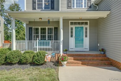 Enjoy relaxing on your country front porch.