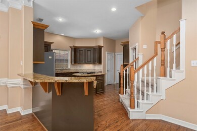 Kitchen open to dinning room and family room.