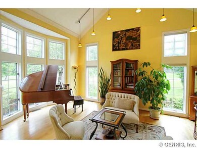 Living Room. A gorgeous antique piano  sits in a l