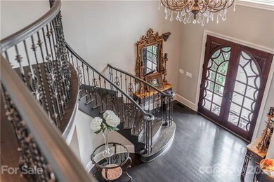 Foyer with grand front staircase, hardwoods upstai