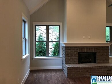 upgraded brick hearth with gas logs.