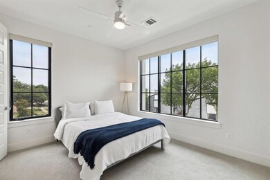 Bedroom featuring carpet flooring and ceiling fan