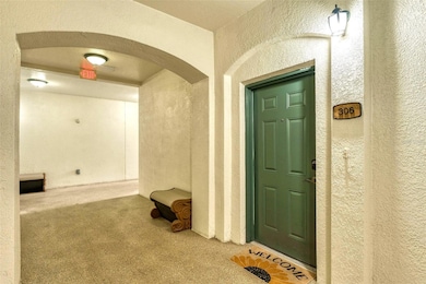 Covered entrance with valet trash service