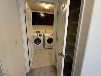 Clothes washing area with washing machine and drye
