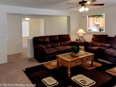 Family room with view of Den open doors