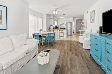 Living room featuring wood-type flooring and ceili