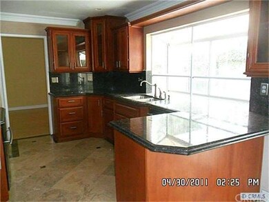 KITCHEN WITH LOVELY GREENHOUSE WINDOW