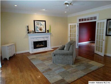 Den has recessed lighting, fireplace and room for 