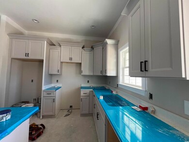 Kitchen with white cabinetry