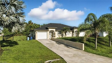 Single story home featuring concrete driveway, stucco siding, a garage, a front yard, and roof with shingles