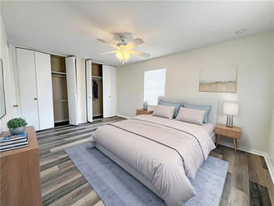 Bedroom is virtually staged.