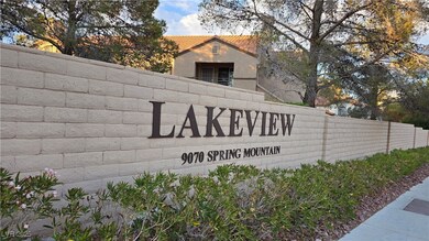 Community / neighborhood sign featuring fence