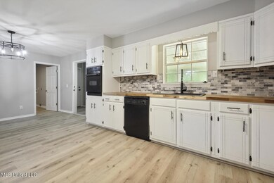 Kitchen overlooking dining