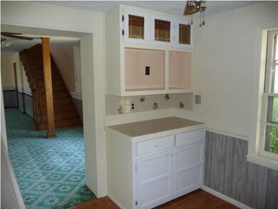 Counter with storage in kitchen. Kitchen also has 