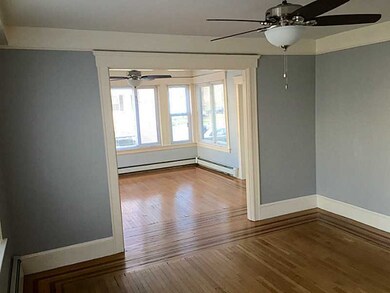 Dining Room. Unit #1; Dining room looking into liv