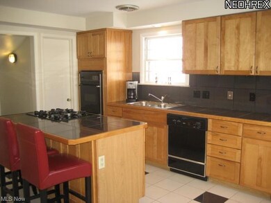 Fantastic Eat-In Kitchen With Center Island and Mu