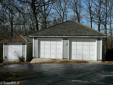 Parking Lot/Garage. Detached Garage & Storage Building