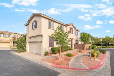 Mediterranean / spanish-style home with stucco siding, an attached garage, and driveway
