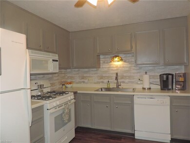 Updated kitchen with updated cabinets and newer di