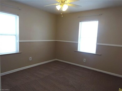 Bedroom Two: Located on the first floor