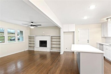 Wood burning fireplace w/ built-ins