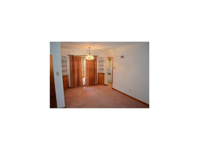 Dining Area. Built in corner cupboards in the dini