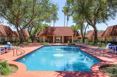Community pool with a patio area