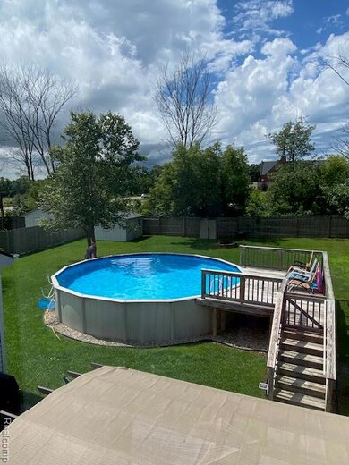 239 Andover Woods Dr unit 64, Fenton, MI 48430 - photo 2