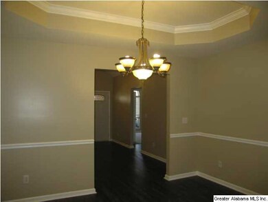 Formal Dining Room with a tray ceiling.
