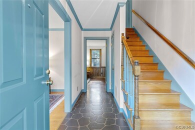 Solid wood stairs head to the second floor.