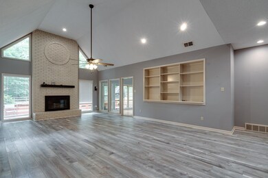 Unfurnished living room with light wood-type floor