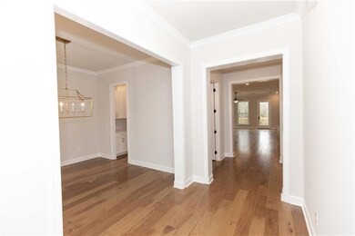 Step inside the foyer and find hard surface floors