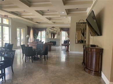 club house with ornamental molding, a chandelier, and French doors