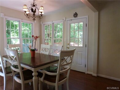 Charming Dining Area...Overlooking Back deck and y