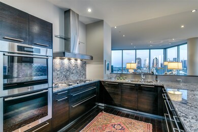 Kitchen with stainless steel appliances, wall chim