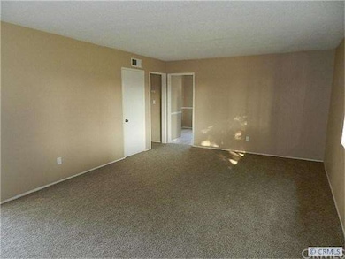 Another View of Family Leading to Kitchen