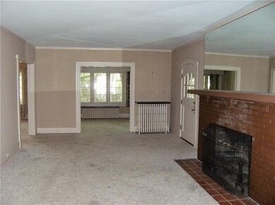 Living Room Looking Towards Sunroom And Dining Roo