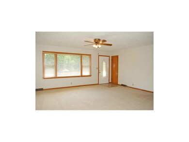 Large Living Room 17' x 15' with tile entry.
