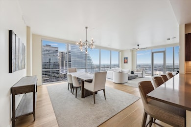 Dining area featuring light wood-style floors, a 